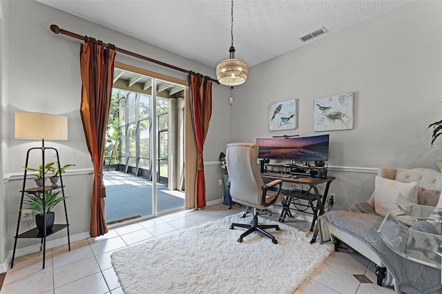 10033 Hart Branch Cir, Orlando, FL 32832 - tiled home office featuring baseboards and a textured ceiling