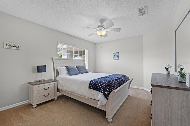 10033 Hart Branch Cir, Orlando, FL 32832 - bedroom with light carpet, baseboards, a ceiling fan, and a textured ceiling