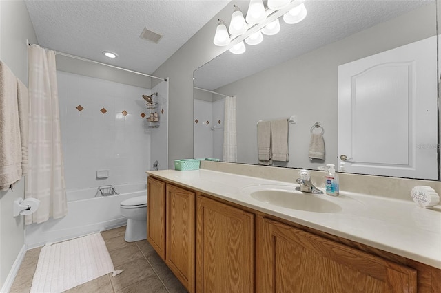 10033 Hart Branch Cir, Orlando, FL 32832 - full bath with vanity, shower / tub combo, toilet, tile patterned floors, and a textured ceiling
