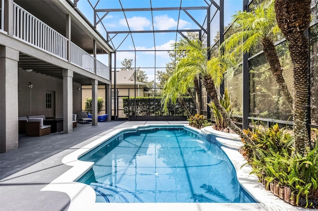 10033 Hart Branch Cir, Orlando, FL 32832 - outdoor pool featuring outdoor lounge area, a patio area, and a lanai