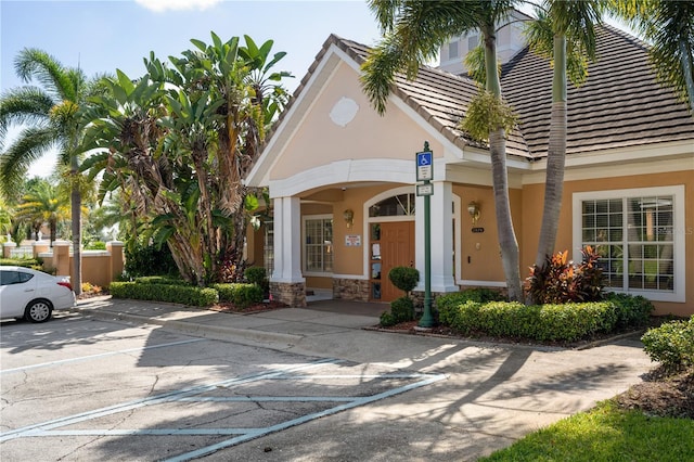 7420 Cypress Grove Rd Unit 132, Orlando, FL 32819 - view of property featuring uncovered parking