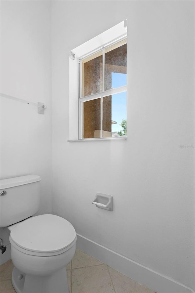 456 Harbor Winds Ct, Winter Springs, FL 32708 - bathroom with toilet, baseboards, and tile patterned flooring