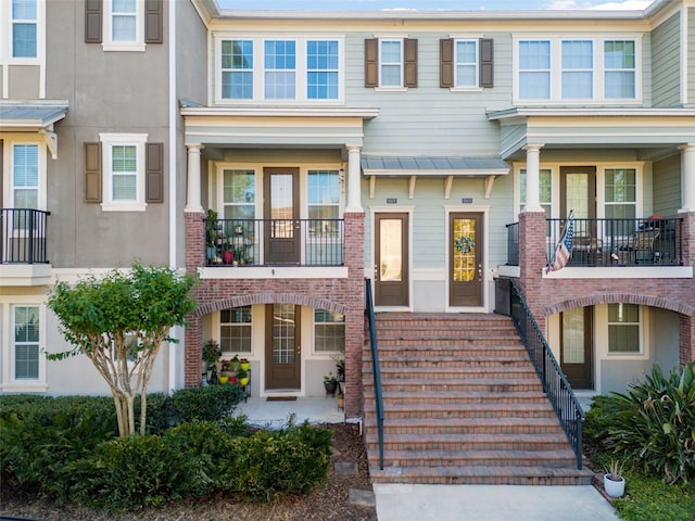 861 Taramundi Dr, Oviedo, FL 32765 - view of property featuring stucco siding and stairs