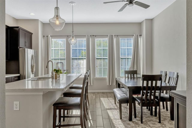 861 Taramundi Dr, Oviedo, FL 32765 - dining area with recessed lighting, a ceiling fan, baseboards, and light tile patterned floors