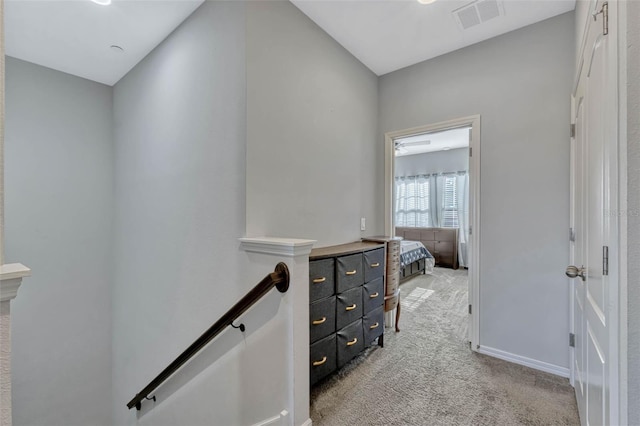 861 Taramundi Dr, Oviedo, FL 32765 - hall with light colored carpet, an upstairs landing, and visible vents