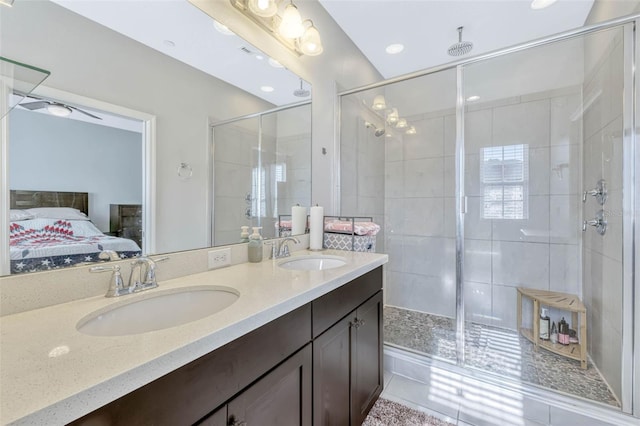 861 Taramundi Dr, Oviedo, FL 32765 - bathroom with ensuite bath, a sink, double vanity, and a stall shower