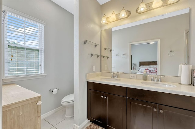 861 Taramundi Dr, Oviedo, FL 32765 - ensuite bathroom with double vanity, baseboards, ensuite bathroom, and a sink