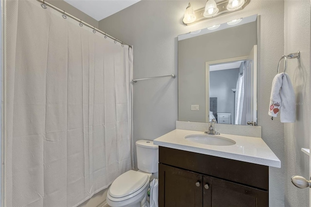 861 Taramundi Dr, Oviedo, FL 32765 - bathroom with vanity, a shower with shower curtain, and toilet