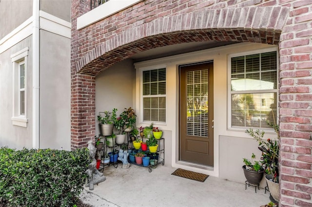 861 Taramundi Dr, Oviedo, FL 32765 - property entrance featuring brick siding