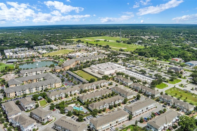 861 Taramundi Dr, Oviedo, FL 32765 - bird's eye view with golf course view, a residential view, and a water view