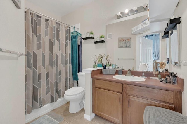 8213 Claire Ann Dr Unit 108, Orlando, FL 32825 - full bath with toilet, tile patterned floors, a shower with curtain, and vanity