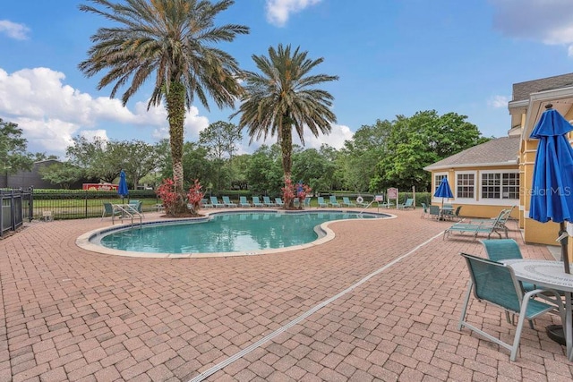 8213 Claire Ann Dr Unit 108, Orlando, FL 32825 - pool with a patio area and fence