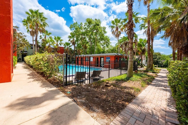 community pool with fence