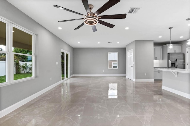 3 Orange Blossom Dr, Eustis, FL 32726 - unfurnished living room featuring recessed lighting, visible vents, a ceiling fan, and baseboards