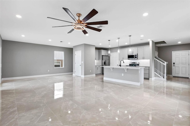 3 Orange Blossom Dr, Eustis, FL 32726 - unfurnished living room with marble finish floor, a ceiling fan, baseboards, and recessed lighting