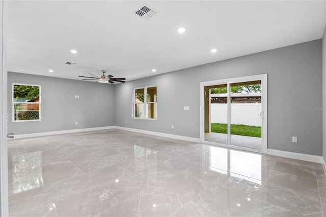 3 Orange Blossom Dr, Eustis, FL 32726 - empty room with marble finish floor, visible vents, and recessed lighting