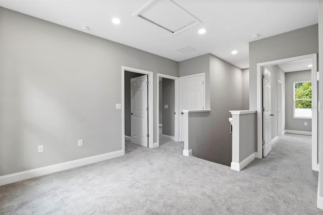 3 Orange Blossom Dr, Eustis, FL 32726 - carpeted empty room featuring attic access, baseboards, and recessed lighting