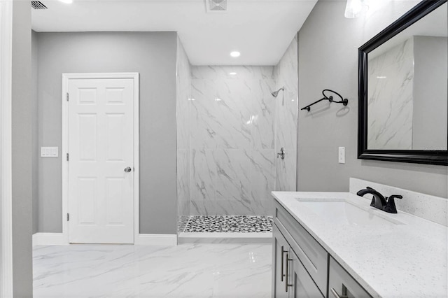 3 Orange Blossom Dr, Eustis, FL 32726 - bathroom featuring a marble finish shower, vanity, marble finish floor, baseboards, and visible vents