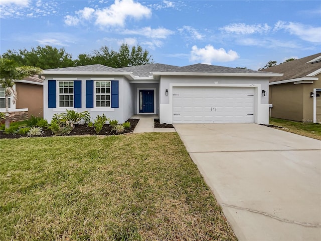 ranch-style house featuring a garage, stucco siding, driveway, and a front yard