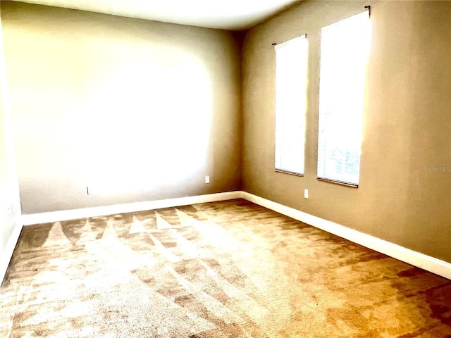 9046 Tuscan Valley Pl, Orlando, FL 32825 - empty room with carpet floors and baseboards