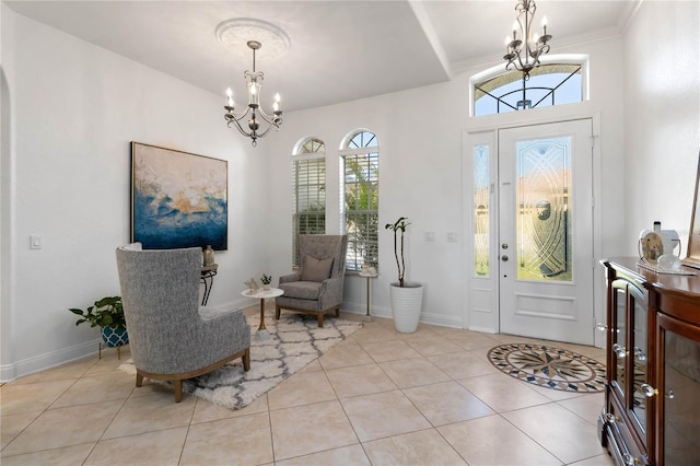 entryway with baseboards, light tile patterned floors, and an inviting chandelier