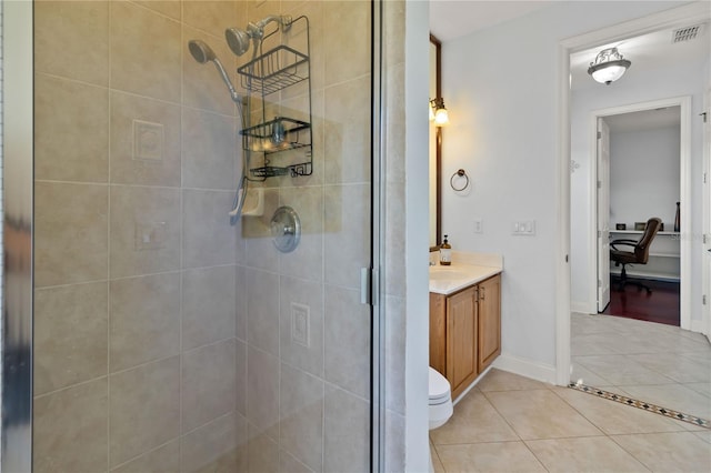 bathroom featuring a shower stall, visible vents, tile patterned floors, and vanity