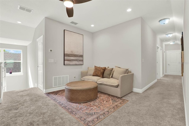 1821 Simonton Ave, Orlando, FL 32806 - carpeted living room with visible vents, baseboards, and ceiling fan