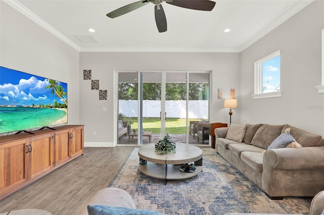 1821 Simonton Ave, Orlando, FL 32806 - living area with recessed lighting, a ceiling fan, ornamental molding, light wood-style floors, and baseboards