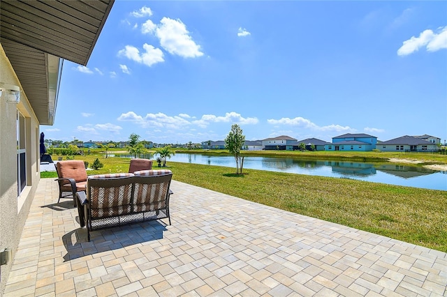 4094 San Clemente Ct, North Fort Myers, FL 33917 - view of patio with a water view and a residential view