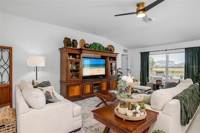 4094 San Clemente Ct, North Fort Myers, FL 33917 - living area with visible vents, a ceiling fan, and vaulted ceiling