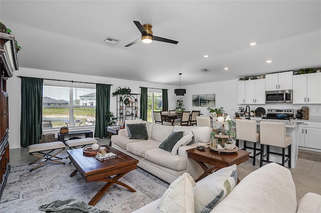 4094 San Clemente Ct, North Fort Myers, FL 33917 - living area featuring visible vents, a ceiling fan, and recessed lighting