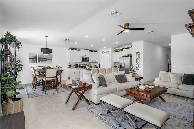 4094 San Clemente Ct, North Fort Myers, FL 33917 - living area with visible vents, a ceiling fan, and light tile patterned floors