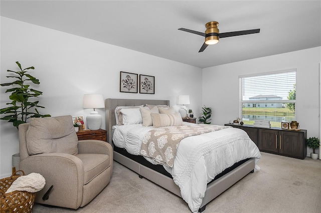 4094 San Clemente Ct, North Fort Myers, FL 33917 - bedroom with a ceiling fan and light carpet