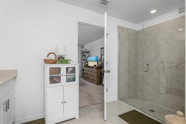 4094 San Clemente Ct, North Fort Myers, FL 33917 - bathroom with a shower stall, tile patterned floors, visible vents, and baseboards