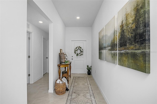 4094 San Clemente Ct, North Fort Myers, FL 33917 - hall featuring recessed lighting, light tile patterned floors, and baseboards