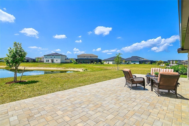 4094 San Clemente Ct, North Fort Myers, FL 33917 - view of patio / terrace featuring a water view and a residential view
