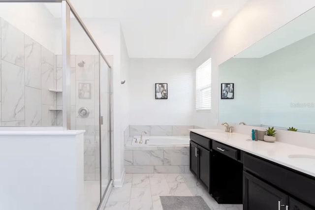 1013 Leader St, Davenport, FL 33896 - full bathroom featuring a shower stall, a bath, marble finish floor, a sink, and double vanity