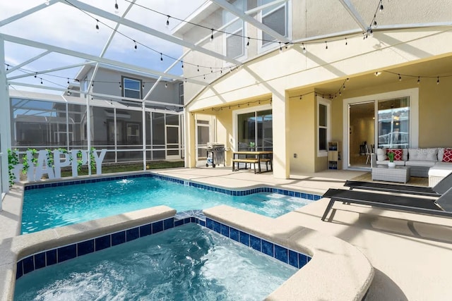 1013 Leader St, Davenport, FL 33896 - view of swimming pool with a patio, outdoor lounge area, a grill, a lanai, and a pool with connected hot tub