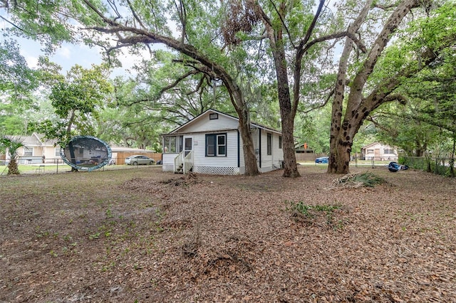 view of home's exterior featuring a fenced backyard and entry steps