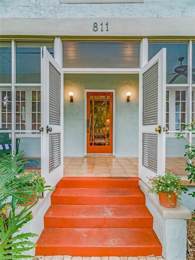 811 Laurel Ave, Orlando, FL 32803 - entrance to property featuring french doors, stucco siding, and a porch