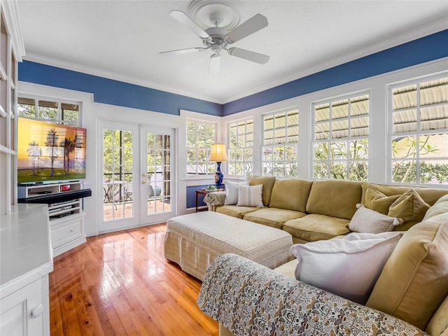 811 Laurel Ave, Orlando, FL 32803 - living room featuring light wood-style floors, a ceiling fan, french doors, and ornamental molding