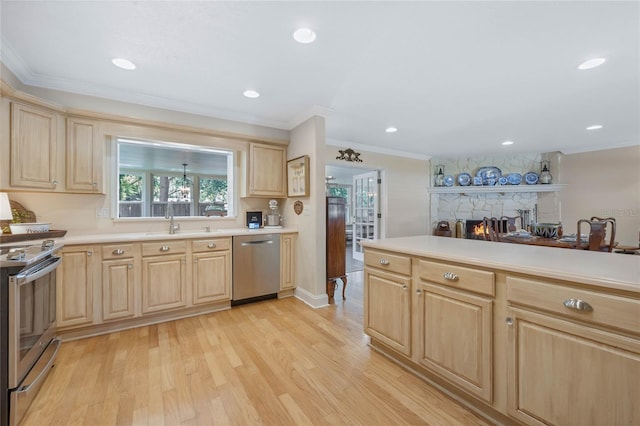 3015 Dawley Ave, Orlando, FL 32806 - kitchen featuring light brown cabinets, appliances with stainless steel finishes, light wood-style flooring, ornamental molding, and light countertops