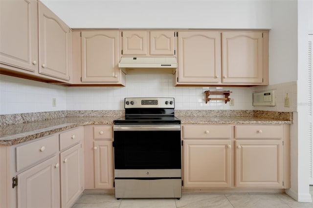 1517 Abberton Dr, Orlando, FL 32837 - kitchen featuring stainless steel electric range, cream cabinets, backsplash, under cabinet range hood, and light stone countertops
