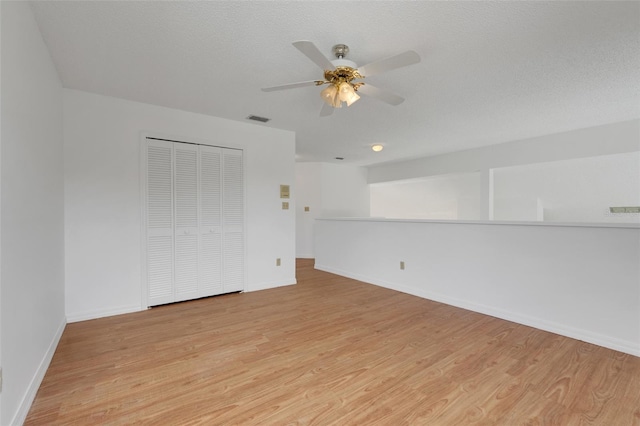1517 Abberton Dr, Orlando, FL 32837 - unfurnished room featuring visible vents, ceiling fan, light wood-style floors, and baseboards