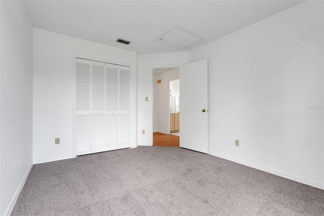 1517 Abberton Dr, Orlando, FL 32837 - unfurnished bedroom with a closet, baseboards, carpet, and visible vents