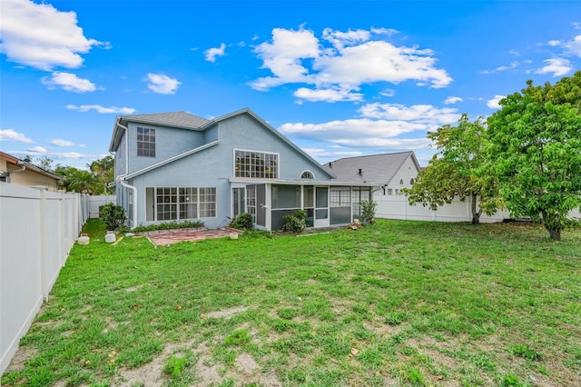 1517 Abberton Dr, Orlando, FL 32837 - back of house with a sunroom, a yard, a fenced backyard, and stucco siding