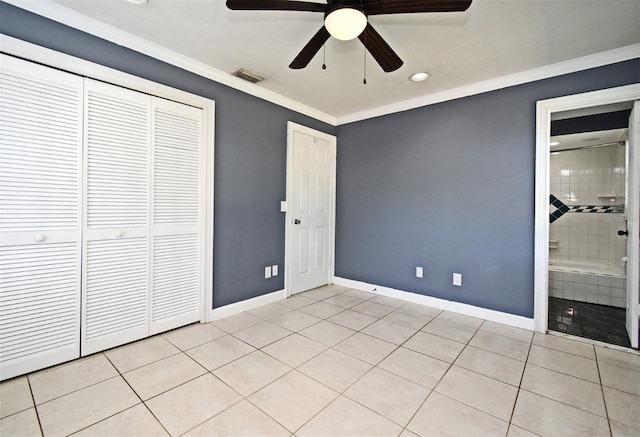 unfurnished bedroom with ornamental molding, visible vents, baseboards, and light tile patterned floors