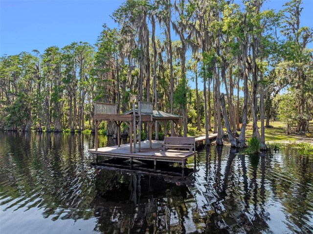 6037 Lake Erie Rd, Groveland, FL 34736 - dock featuring a water view