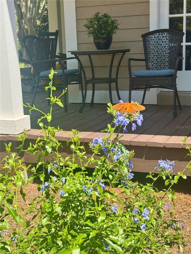 6037 Lake Erie Rd, Groveland, FL 34736 - view of wooden balcony featuring a deck