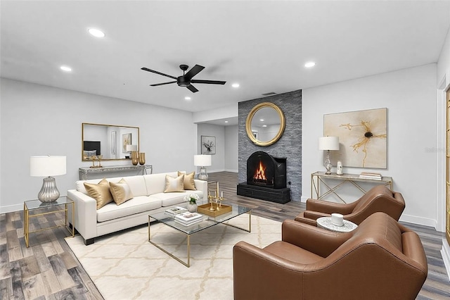 505 Lake Shore Dr, Maitland, FL 32751 - living area with baseboards, recessed lighting, wood finished floors, a large fireplace, and ceiling fan
